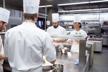 Chef, kitchen and hospitality with working and food prep for a restaurant with fine dining staff....