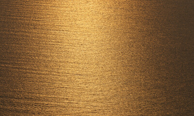 Abstract background of sea surface with golden sunlight in the morning.