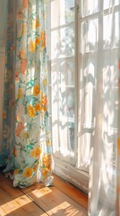 floral curtain hanging beside a window in a room with wooden flooring. 