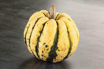Ripe raw fresh decorative pumpkin