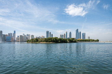 Obraz premium Panorama of the center of the Emirate of Sharjah, United Arab Emirates . Corniche area of Sharjah, UAE city.