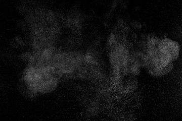 White texture on black background. Dark textured pattern. Abstract dust overlay. Light powder explosion.	
