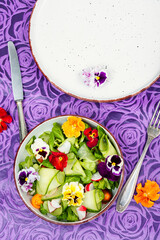 Vitamin vegetables salad with flowers.