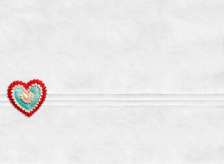 Horizontal Christmas backdrop with suede texture of ivory color and felt heart.  Can be used for...