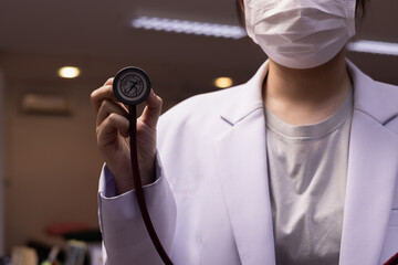 Doctor holding stethoscope. Healthcare concept.