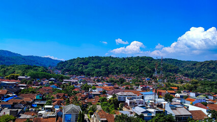 high angle view of the Indonesian city (Sumedang) or buildings and houses on the edge of the...