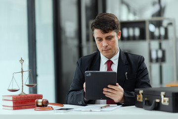 Fototapeta premium Law, Lawyer man working at law office.