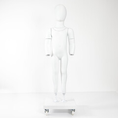 white imaginary mannequin on wheels