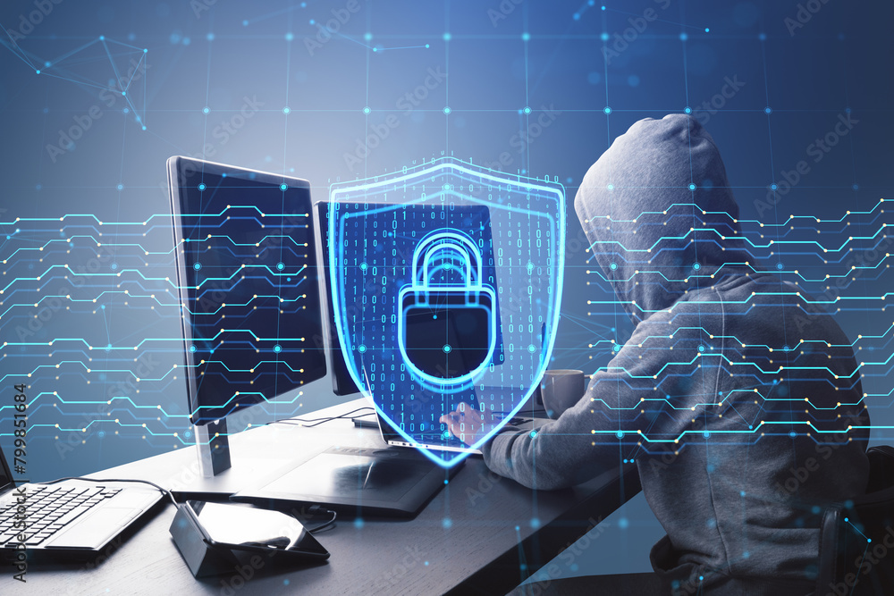 Poster Side view of hacker at desk using computers with glowing digital padlock hologram on dark background. Safety and security concept. Double exposure.