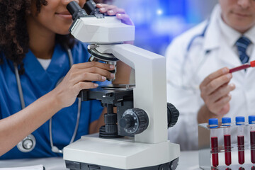 Medical science and microscope in laboratory for research concept. Two scientist with microscope Work in the lab.