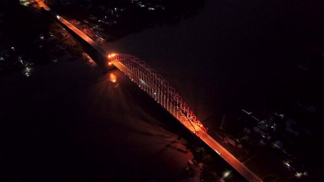 Rumpiang Bridge in the night, a bridge that stretches over the Barito river, Marabahan city, Barito Kuala district, South Kalimantan