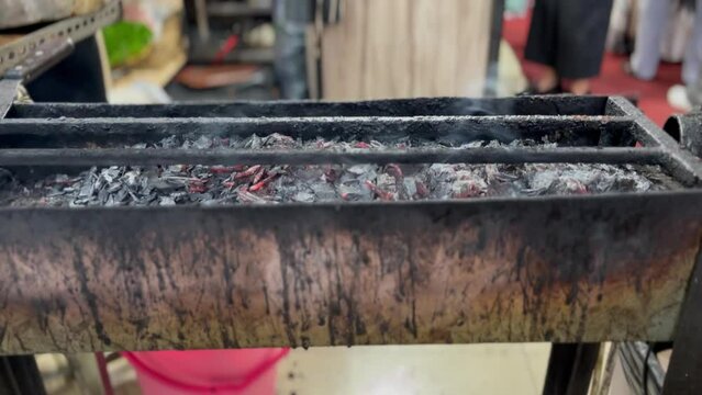 a place to burn satai made from charcoal