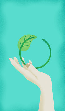 Hand with leaf against turquoise background