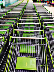 close up group of trolley waiting for service customer in supermaket