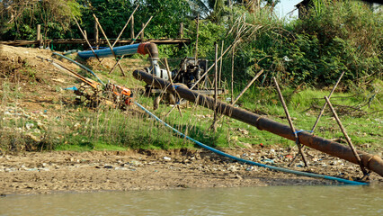water punp at the shore of tonle sap river in cambodia
