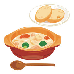 皿に盛られたクリームシチューとバゲット