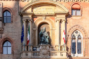 The statue of Pope Gregory XIII sits prominently on the facade of Palazzo d'Accursio in Bologna,...