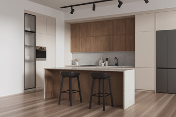 Elegant home kitchen interior with bar island, cooking cabinet and fridge