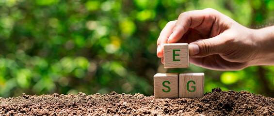wooden cubes with icon ESG, environment social governance investment business concept and sustainable organizational development for society, Earth and environment conservation concept.