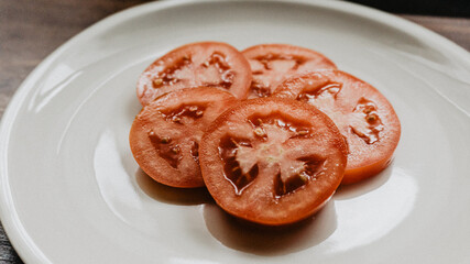 Tomato slices on a plate