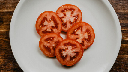 Tomato slices on a plate