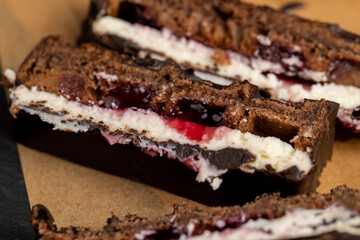 cottage cheese dessert with cherry jam covered with chocolate