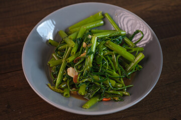 Stir fried morning glory. Stir fried vegetable. Thai food. Eat with rice .