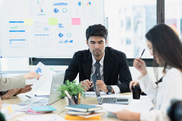 Team of Asian business people and working together in office, Startup projects and business presentation.