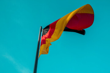 Flag of Germany. Close up waving flag of Germany. Flag symbols of Germany