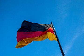 Flag of Germany. Close up waving flag of Germany. Flag symbols of Germany