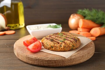 Delicious vegetarian cutlet served on wooden table