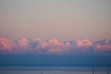 Horizon over the sea minimalist seascape with space for text, calm blue sea and sunset sky great...