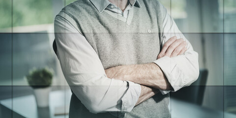 Businessman with arms crossed, geometric pattern