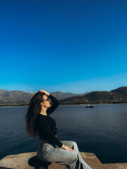 beautiful young woman on the background of the sea. Corsica. France