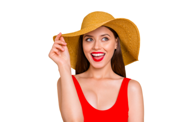 Beach time! Close up portrait of girl holds a hat with one hand laughing and looking in the side isolated on yellow background