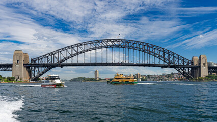 Fototapeta na wymiar Sydney, New South Wales, Australia: View of Sydney Harbour Bridge and ferry boats