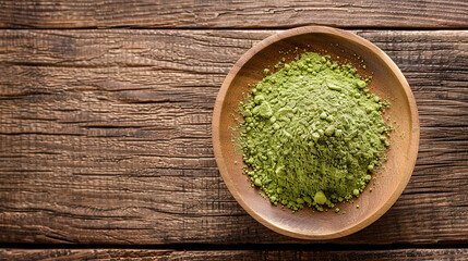 Green matcha powder for making drink on wooden background