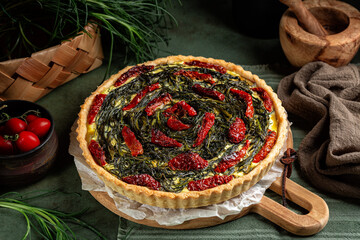 Italian rustic savory pie made with pie crust, salsola soda or agretti, ricotta cheese, eggs and...