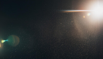 Obraz premium Designed film texture background with heavy grain, dust and a light leak Real Lens Flare Shot in Studio over Black Background. Easy to add as Overlay or Screen Filter over Photos overlay