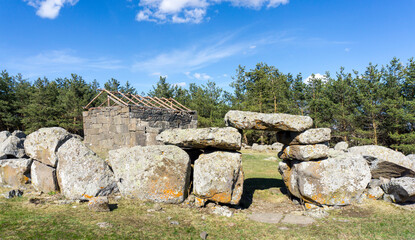 Megalithic fence and portal around Aia Constantine church of Tejisi village. Huge stones....