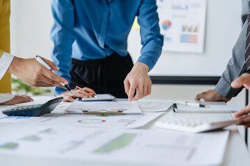 Analyzing results, an accountant, businessman or financial expert analyzes results. Calculates results from graphs, business reports and financial charts. Company stock market.