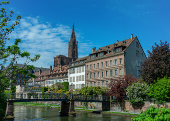 Strasbourg. Old town. waterside promenade  of the Ill with the cathedral. France, Europe