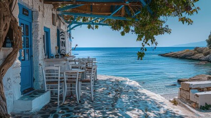 Greek culture with traditional white and blue greek architecture, taverna by the sea - obrazy, fototapety, plakaty