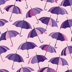 Fototapeta na wymiar a lot of purple and pink umbrellas on a pink background