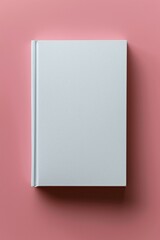 White book on a pink background