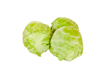Three heads of white cabbage isolated on white background. A vegetable rich in vitamins and minerals. Excellent harvest. Healthy food. Farm agricultural eco products. Close-up. Fresh foodstuffs