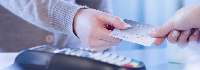 Convenient Transactions: Payment with Credit Card Swipe on Reader - Captured in High-Resolution 4K image