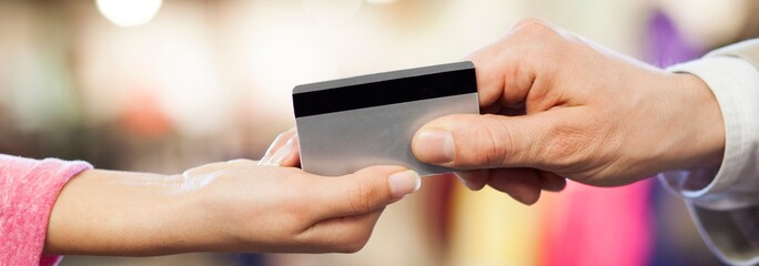 Convenient Transactions: Payment with Credit Card Swipe on Reader - Captured in High-Resolution 4K image