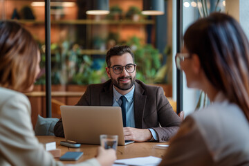 Fototapeta premium The business team was having an office meeting, discussing ideas and planning projects in the modern company conference room.