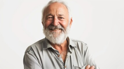 Obraz premium Portrait of a beautiful elderly man isolated in the white background. The concept of active old age. Support for the elderly. A happy pensioner. Beautiful aging